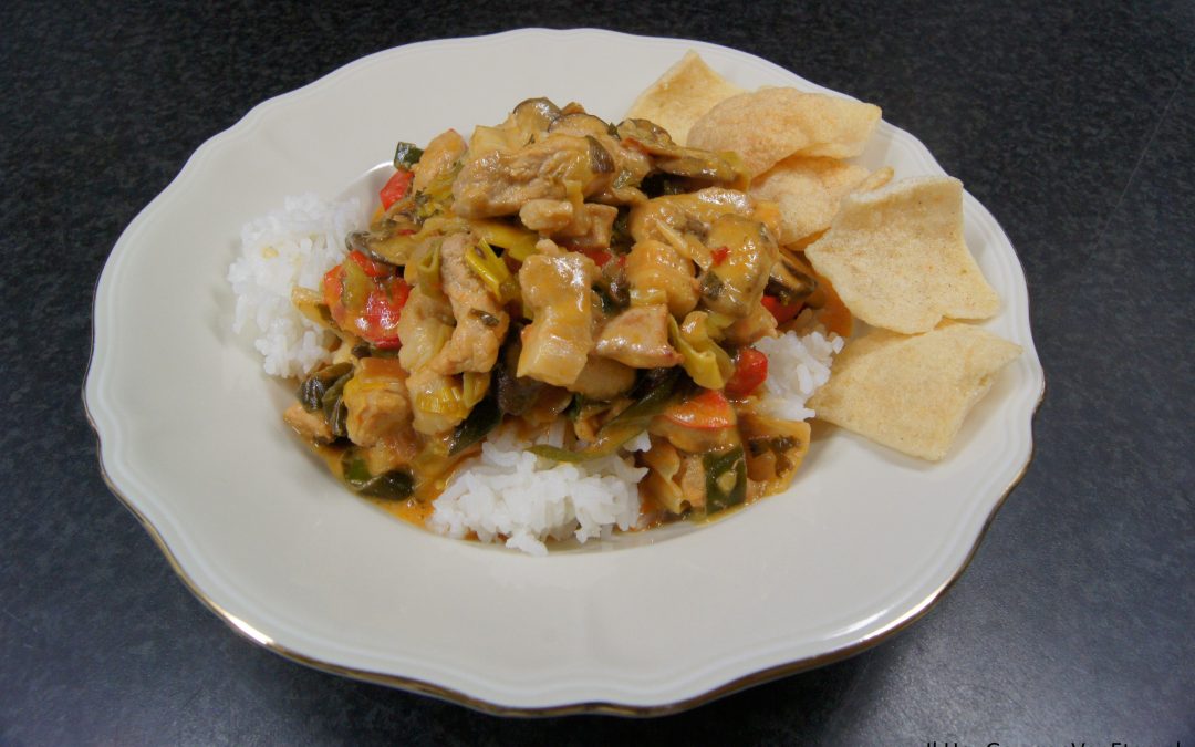 Rode curry van varkensreepjes en roerbakgroenten