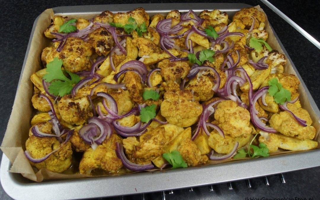 Curry van de bakplaat met kip, bloemkool en Eddo